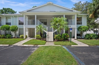 Turnkey 2-bedroom plus den, 2-bath second-floor, end unit condo on The Old Collier Golf Club in Florida - for sale on GolfHomes.com, golf home, golf lot