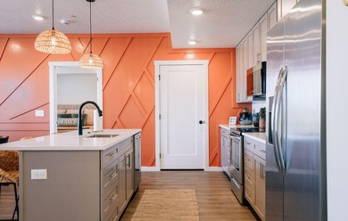 Vacation-Ready Condo in Desert Color - Fully Furnished & Steps on Sunriver Golf Club in Utah - for sale on GolfHomes.com, golf home, golf lot