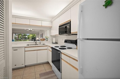 Turnkey 2-bedroom plus den, 2-bath second-floor, end unit condo on The Old Collier Golf Club in Florida - for sale on GolfHomes.com, golf home, golf lot