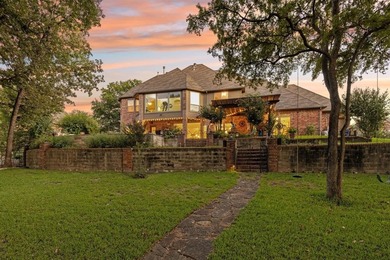 This beautifully maintained, one-owner home sits on just under on The Golf Club at Resort Eagle Mountain Lake in Texas - for sale on GolfHomes.com, golf home, golf lot