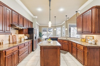 This beautifully maintained, one-owner home sits on just under on The Golf Club at Resort Eagle Mountain Lake in Texas - for sale on GolfHomes.com, golf home, golf lot