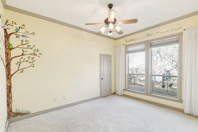 This beautifully maintained, one-owner home sits on just under on The Golf Club at Resort Eagle Mountain Lake in Texas - for sale on GolfHomes.com, golf home, golf lot