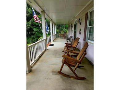 Charming 5 bedroom/4.5 bath Cape Cod-style home in Snellville's on Country Club of Gwinnett in Georgia - for sale on GolfHomes.com, golf home, golf lot