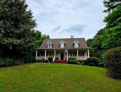 Charming 5 bedroom/4.5 bath Cape Cod-style home in Snellville's on Country Club of Gwinnett in Georgia - for sale on GolfHomes.com, golf home, golf lot