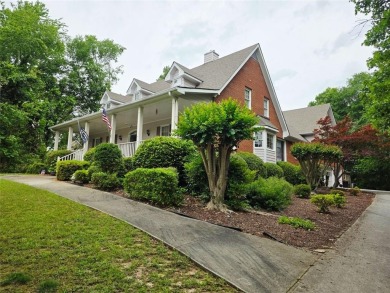 Charming 5 bedroom/4.5 bath Cape Cod-style home in Snellville's on Country Club of Gwinnett in Georgia - for sale on GolfHomes.com, golf home, golf lot
