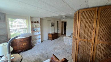 Charming Manufactured Home on Private Golf Course Lot in Riviera on Riviera Golf Club in Florida - for sale on GolfHomes.com, golf home, golf lot