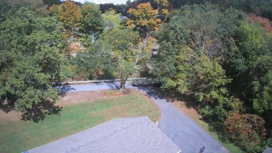 This split level home has fantastic curb appeal & is surrounded on Blackstone National Golf Course in Massachusetts - for sale on GolfHomes.com, golf home, golf lot