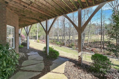 Step through these beautiful Clark Hall custom steel double on The Palisades Country Club in North Carolina - for sale on GolfHomes.com, golf home, golf lot