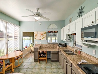 The port cover measures 23'x47'x13' high with a furnished on The Great Outdoors Golf and Country Club in Florida - for sale on GolfHomes.com, golf home, golf lot