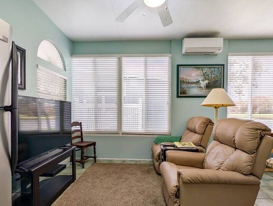 The port cover measures 23'x47'x13' high with a furnished on The Great Outdoors Golf and Country Club in Florida - for sale on GolfHomes.com, golf home, golf lot