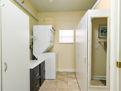 The port cover measures 23'x47'x13' high with a furnished on The Great Outdoors Golf and Country Club in Florida - for sale on GolfHomes.com, golf home, golf lot