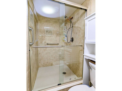 The port cover measures 23'x47'x13' high with a furnished on The Great Outdoors Golf and Country Club in Florida - for sale on GolfHomes.com, golf home, golf lot