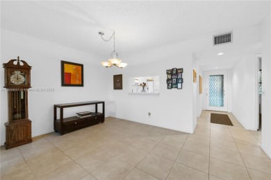 Cambridge at Century Village in Pembroke Pines, a 55+ active on Flamingo Lakes Country Club in Florida - for sale on GolfHomes.com, golf home, golf lot