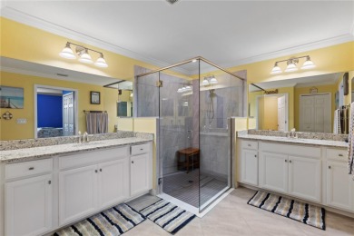 Unlock the door to luxury living in this exquisite coach home on Lakewood National Golf Club in Florida - for sale on GolfHomes.com, golf home, golf lot