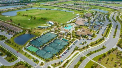 Unlock the door to luxury living in this exquisite coach home on Lakewood National Golf Club in Florida - for sale on GolfHomes.com, golf home, golf lot
