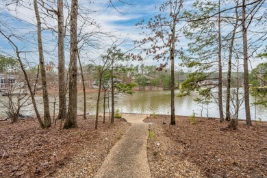 This stately home sits on 221' of Lake Estrella frontage at the on Granada Golf Course in Arkansas - for sale on GolfHomes.com, golf home, golf lot