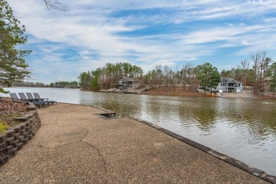 This stately home sits on 221' of Lake Estrella frontage at the on Granada Golf Course in Arkansas - for sale on GolfHomes.com, golf home, golf lot