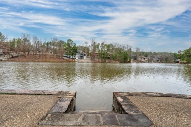 This stately home sits on 221' of Lake Estrella frontage at the on Granada Golf Course in Arkansas - for sale on GolfHomes.com, golf home, golf lot