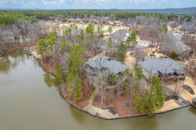 This stately home sits on 221' of Lake Estrella frontage at the on Granada Golf Course in Arkansas - for sale on GolfHomes.com, golf home, golf lot