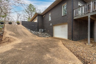 This stately home sits on 221' of Lake Estrella frontage at the on Granada Golf Course in Arkansas - for sale on GolfHomes.com, golf home, golf lot