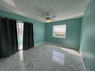 GORGEOUS updated 2 bed 2 bath unit on the 2nd floor in Kings on Kings Point Golf -Flanders Way in Florida - for sale on GolfHomes.com, golf home, golf lot