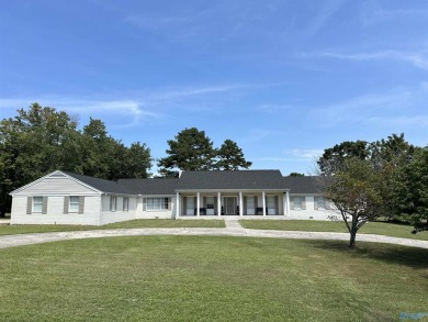 This stunning full-brick home offers a perfect blend of classic on Albertville Golf and Country Club in Alabama - for sale on GolfHomes.com, golf home, golf lot