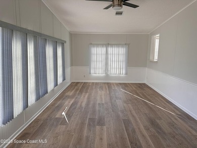 WOW! Move-in-ready and beautifully refreshed, this 2-bedroom on Barefoot Bay Golf Course in Florida - for sale on GolfHomes.com, golf home, golf lot