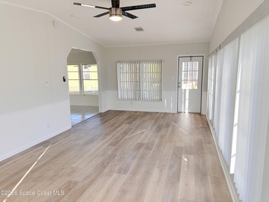 WOW! Move-in-ready and beautifully refreshed, this 2-bedroom on Barefoot Bay Golf Course in Florida - for sale on GolfHomes.com, golf home, golf lot