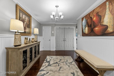 Welcome to this stunning 3-bedroom, 2.5-bathroom brick ranch on Harbour Point Golf Club in North Carolina - for sale on GolfHomes.com, golf home, golf lot