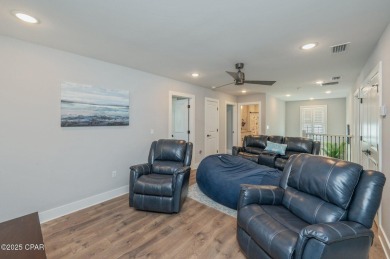 GORGEOUS HOME WITH RELAXING COVERED OUTDOOR SPACE, NEAR THE GULF on Sharks Tooth Golf Club in Florida - for sale on GolfHomes.com, golf home, golf lot