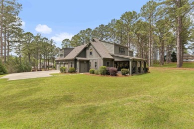 This stunning lake-access home in Cuscowilla offers Lake views on The Golf Club at Cuscowilla in Georgia - for sale on GolfHomes.com, golf home, golf lot