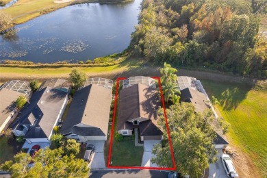 This beautifully maintained 4-bedroom, 2-bathroom pool home is on Ridgewood Lakes Golf and Country Club in Florida - for sale on GolfHomes.com, golf home, golf lot