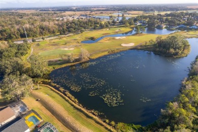 This beautifully maintained 4-bedroom, 2-bathroom pool home is on Ridgewood Lakes Golf and Country Club in Florida - for sale on GolfHomes.com, golf home, golf lot