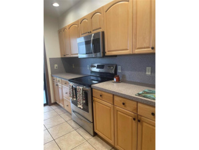 Ground floor condo with no stairs and breathtaking waterviews on Pasadena Yacht and Country Club in Florida - for sale on GolfHomes.com, golf home, golf lot