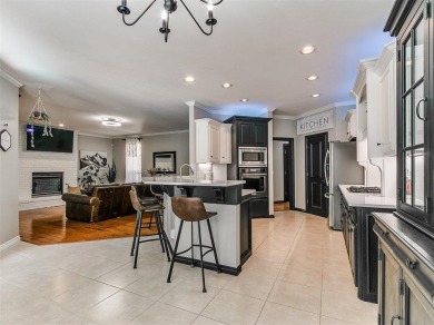 Elegant Home in Gated Golf Course Community with Backyard Oasis! on Fairfax Golf Club in Oklahoma - for sale on GolfHomes.com, golf home, golf lot
