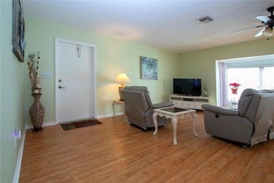 Welcome home to this bright and beautiful EXPANDED Hampton model on Falcon Watch Golf Club in Florida - for sale on GolfHomes.com, golf home, golf lot