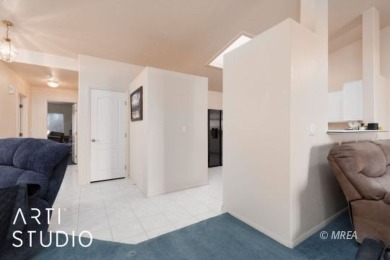 This charming two-bedroom, two-bath townhome in Sunset Greens on CasaBlanca Resort and Casino in Nevada - for sale on GolfHomes.com, golf home, golf lot