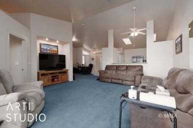 This charming two-bedroom, two-bath townhome in Sunset Greens on CasaBlanca Resort and Casino in Nevada - for sale on GolfHomes.com, golf home, golf lot