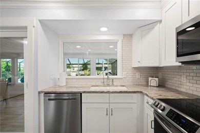 Every inch of this Punta Gorda Isles waterfront residence on Saint Andrews South Golf Club in Florida - for sale on GolfHomes.com, golf home, golf lot