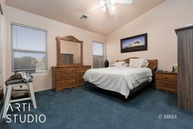 This charming two-bedroom, two-bath townhome in Sunset Greens on CasaBlanca Resort and Casino in Nevada - for sale on GolfHomes.com, golf home, golf lot