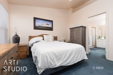 This charming two-bedroom, two-bath townhome in Sunset Greens on CasaBlanca Resort and Casino in Nevada - for sale on GolfHomes.com, golf home, golf lot