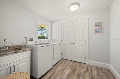 Every inch of this Punta Gorda Isles waterfront residence on Saint Andrews South Golf Club in Florida - for sale on GolfHomes.com, golf home, golf lot