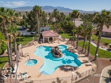 This charming two-bedroom, two-bath townhome in Sunset Greens on CasaBlanca Resort and Casino in Nevada - for sale on GolfHomes.com, golf home, golf lot