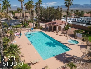 This charming two-bedroom, two-bath townhome in Sunset Greens on CasaBlanca Resort and Casino in Nevada - for sale on GolfHomes.com, golf home, golf lot