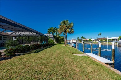 Every inch of this Punta Gorda Isles waterfront residence on Saint Andrews South Golf Club in Florida - for sale on GolfHomes.com, golf home, golf lot