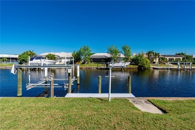 Every inch of this Punta Gorda Isles waterfront residence on Saint Andrews South Golf Club in Florida - for sale on GolfHomes.com, golf home, golf lot