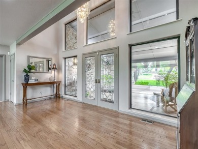 Welcome to this stunning custom home with 5,488 sqft of living on Oak Tree National Golf and Country Club in Oklahoma - for sale on GolfHomes.com, golf home, golf lot