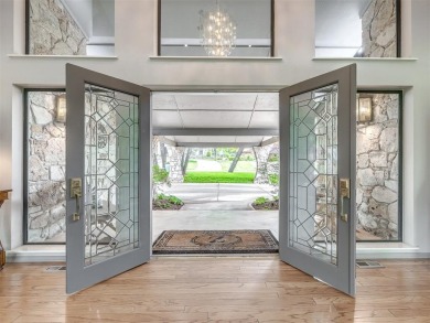 Welcome to this stunning custom home with 5,488 sqft of living on Oak Tree National Golf and Country Club in Oklahoma - for sale on GolfHomes.com, golf home, golf lot