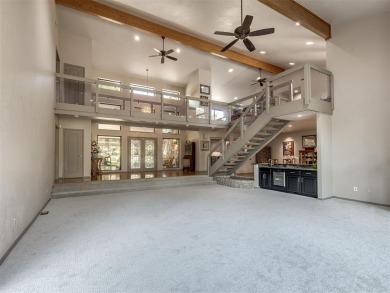 Welcome to this stunning custom home with 5,488 sqft of living on Oak Tree National Golf and Country Club in Oklahoma - for sale on GolfHomes.com, golf home, golf lot