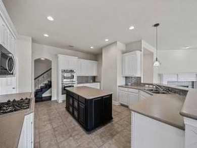 Located in the guard-gated Heritage Lakes community of west on Heritage Lakes - Par 3 - 9 Hole Course in Texas - for sale on GolfHomes.com, golf home, golf lot